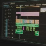Detailed view of a video editing timeline displayed on a computer screen, highlighting the tools used in video production.